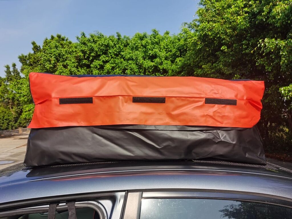 Alfa Gear 15 Cu.ft Patented True Waterproof Car Roof Bag with Non-Slip mats 2 Extra Tie Down Straps Window Hook Straps No Water Leakage at 44X34X17 Black/Orange